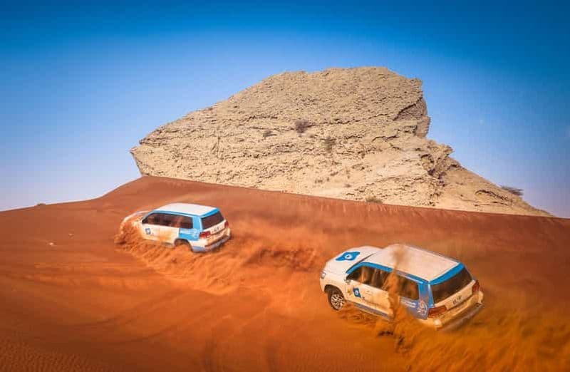 Billet Dubaï : safari dans les dunes rouges avec quad, sandboard et chameaux