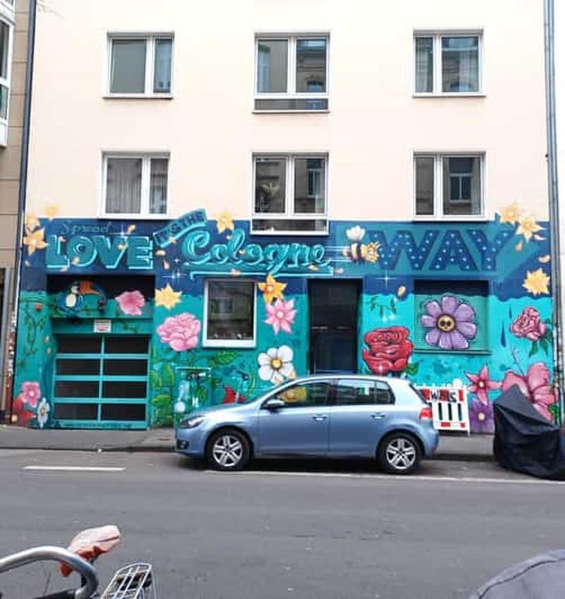 Billet Cologne : visite à pied des arts de la rue dans le quartier belge