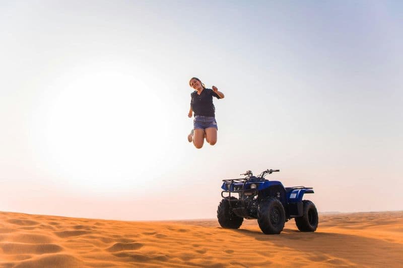 Billet Single quad ride in Dubai Desert with sandboarding, camel ride and BBQ